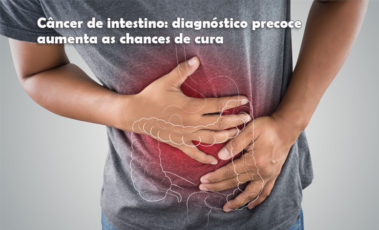 Foto de um homem apertando a região abdominal, com a ilustração do sistema digestório sobreposto à foto, indicando que o homem está com dor na região