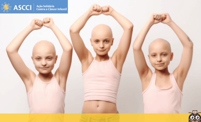Foto de três crianças sem cabelo, vestindo camisetas regatas cor de rosa, com os braços levantandos e os punhos fechados, indicando combate ao câncer infantil